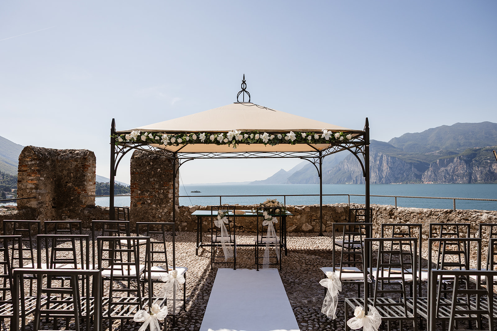 Wedding ceremony terrace at Castello di Malcesine overlooking Lake Garda with panoramic mountain views
