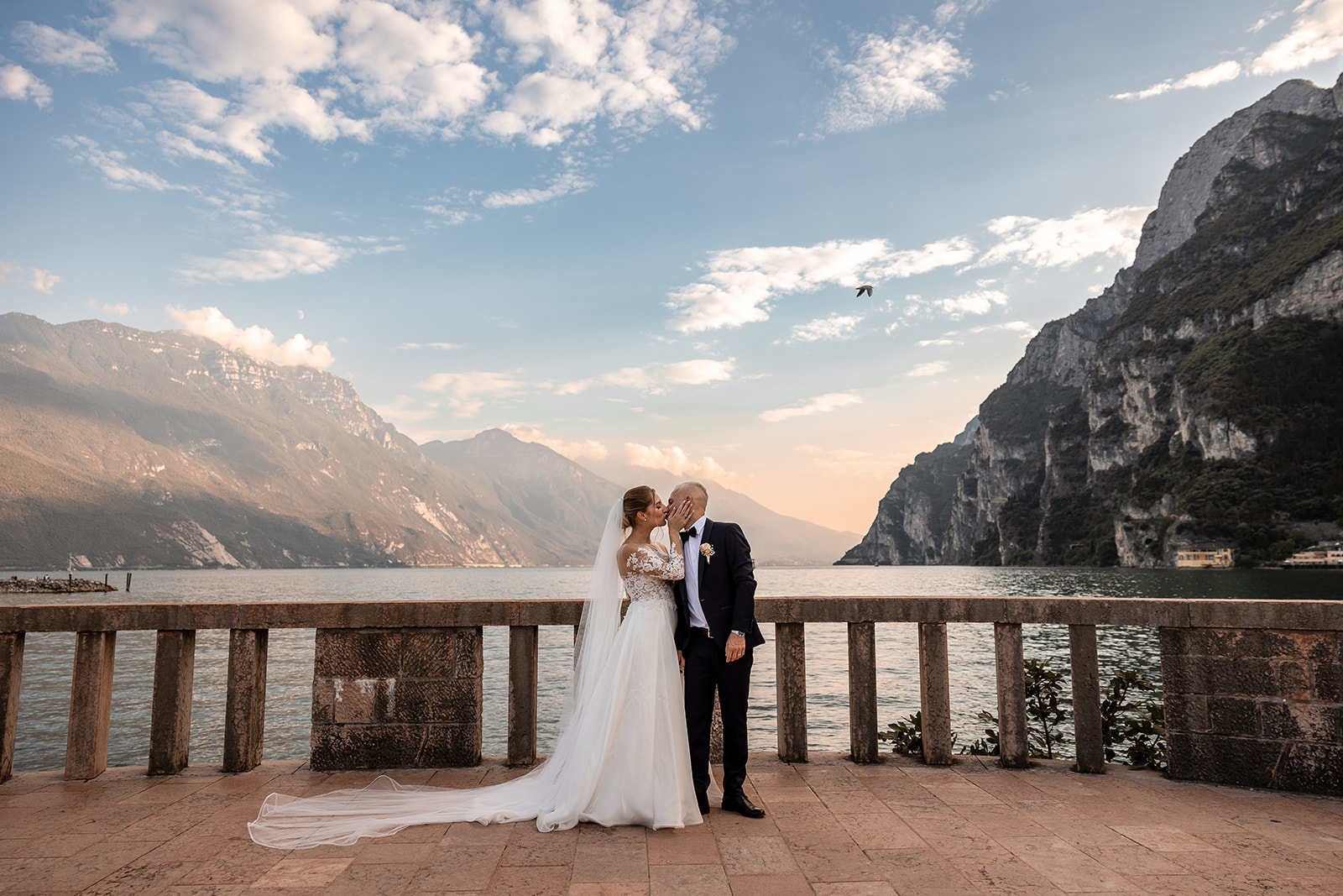 Romantic Lake Garda elopement couple at sunset in Riva del Garda
