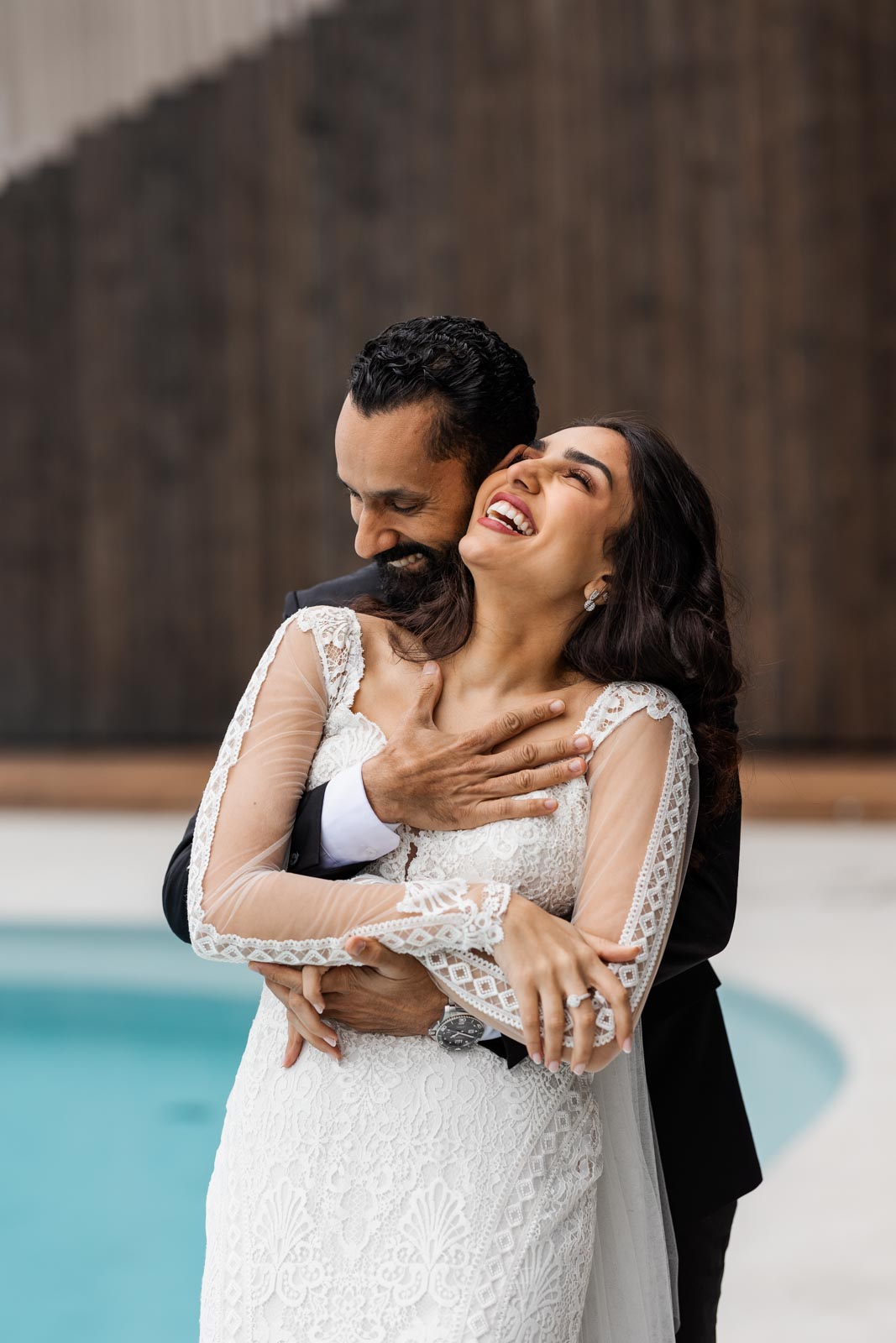 Lake Garda elopement photographer capturing a joyful couple portrait at EALA in Limone sul Garda