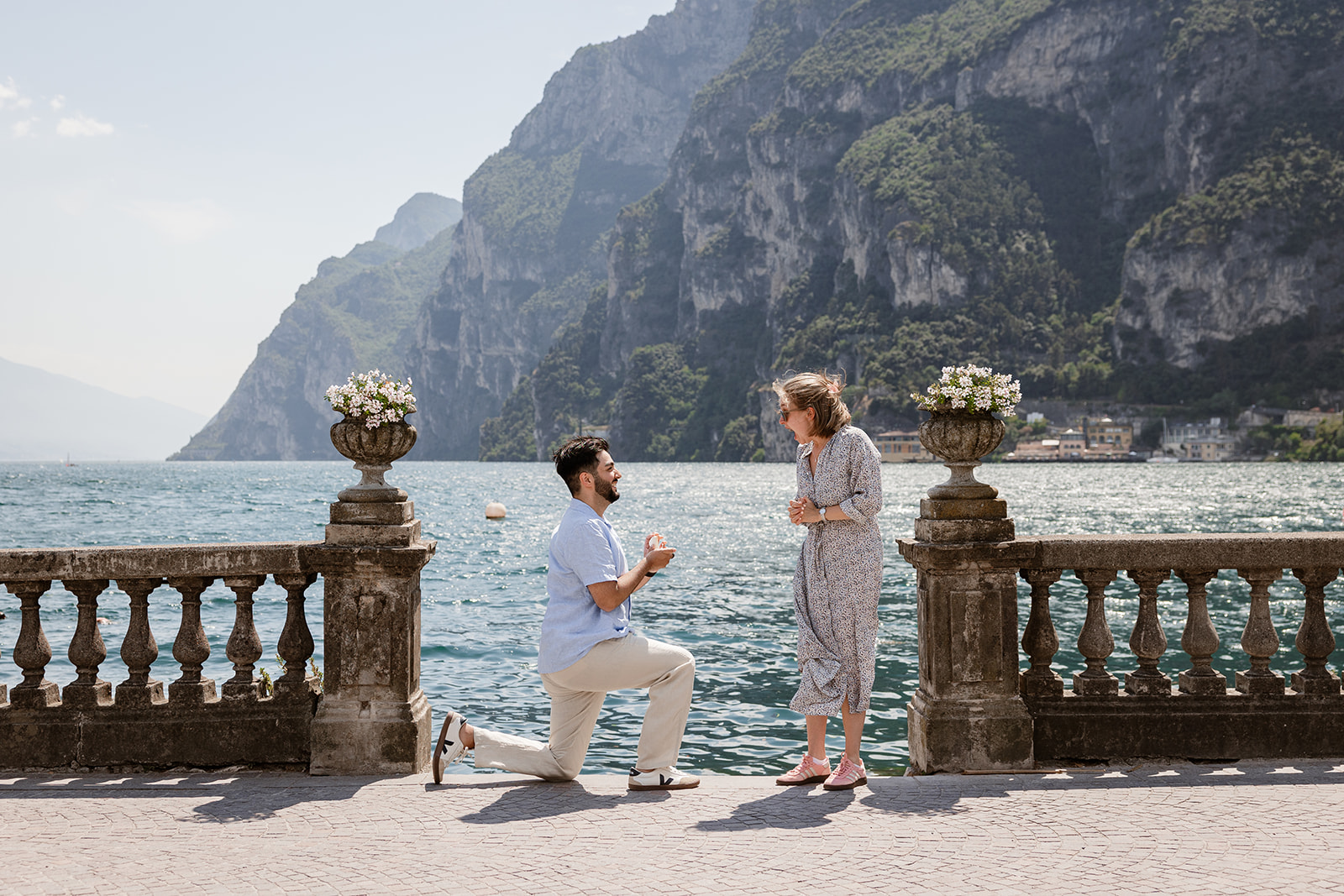 Lake Garda proposal photographer capturing a marriage proposal in Riva del Garda with mountain views