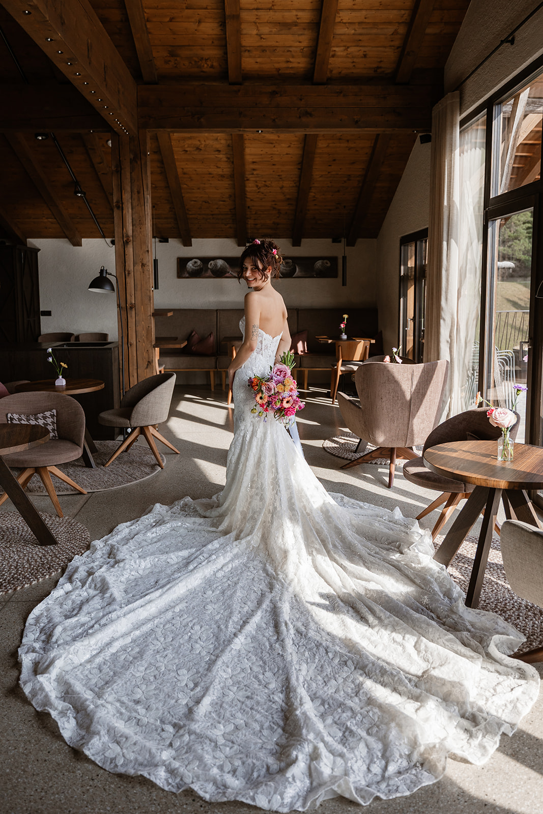 Bride getting ready during the Lake Garda wedding season in an elegant mountain lodge venue in Italy