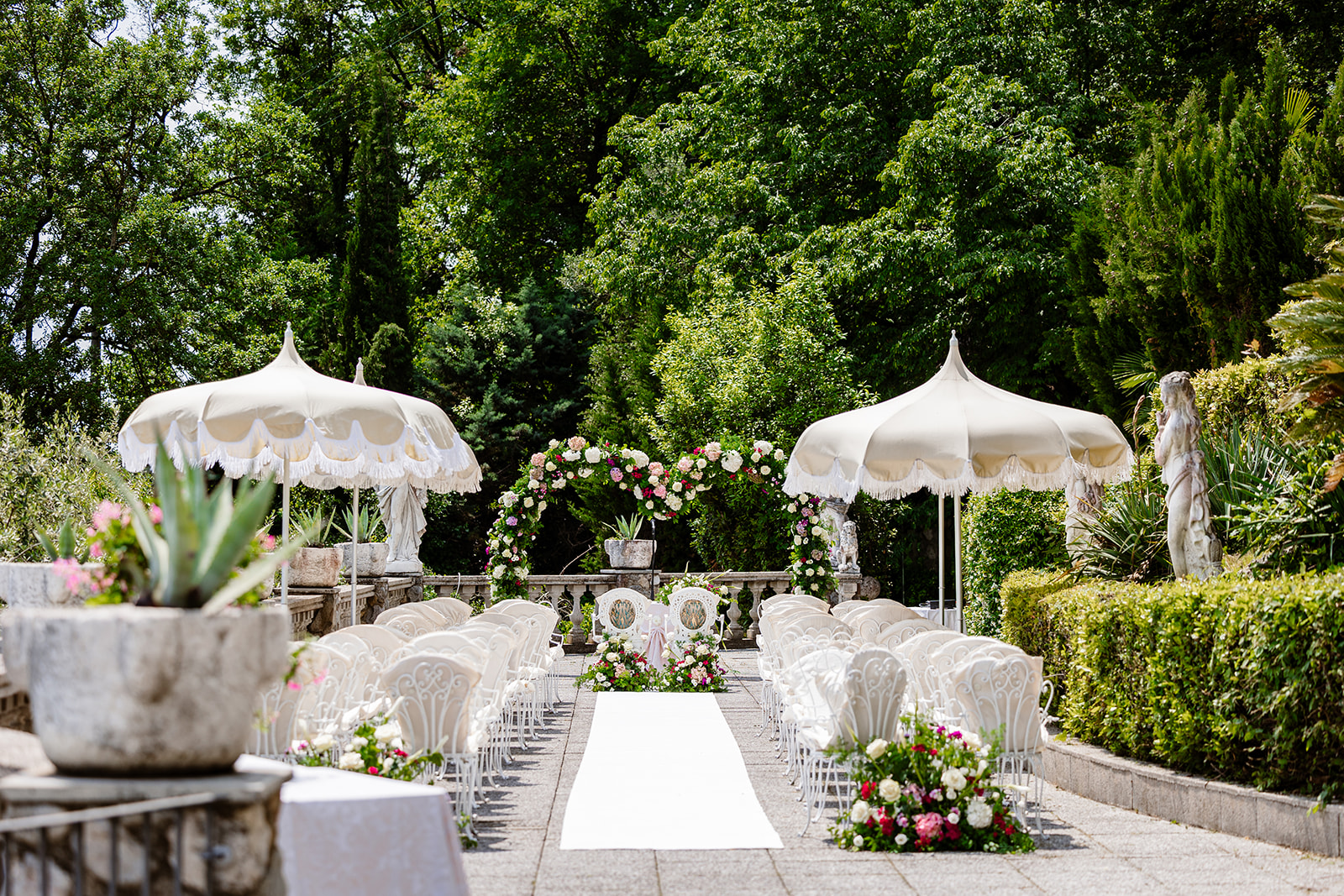 Gardone Riviera wedding ceremony setup in the gardens of a historic villa on Lake Garda