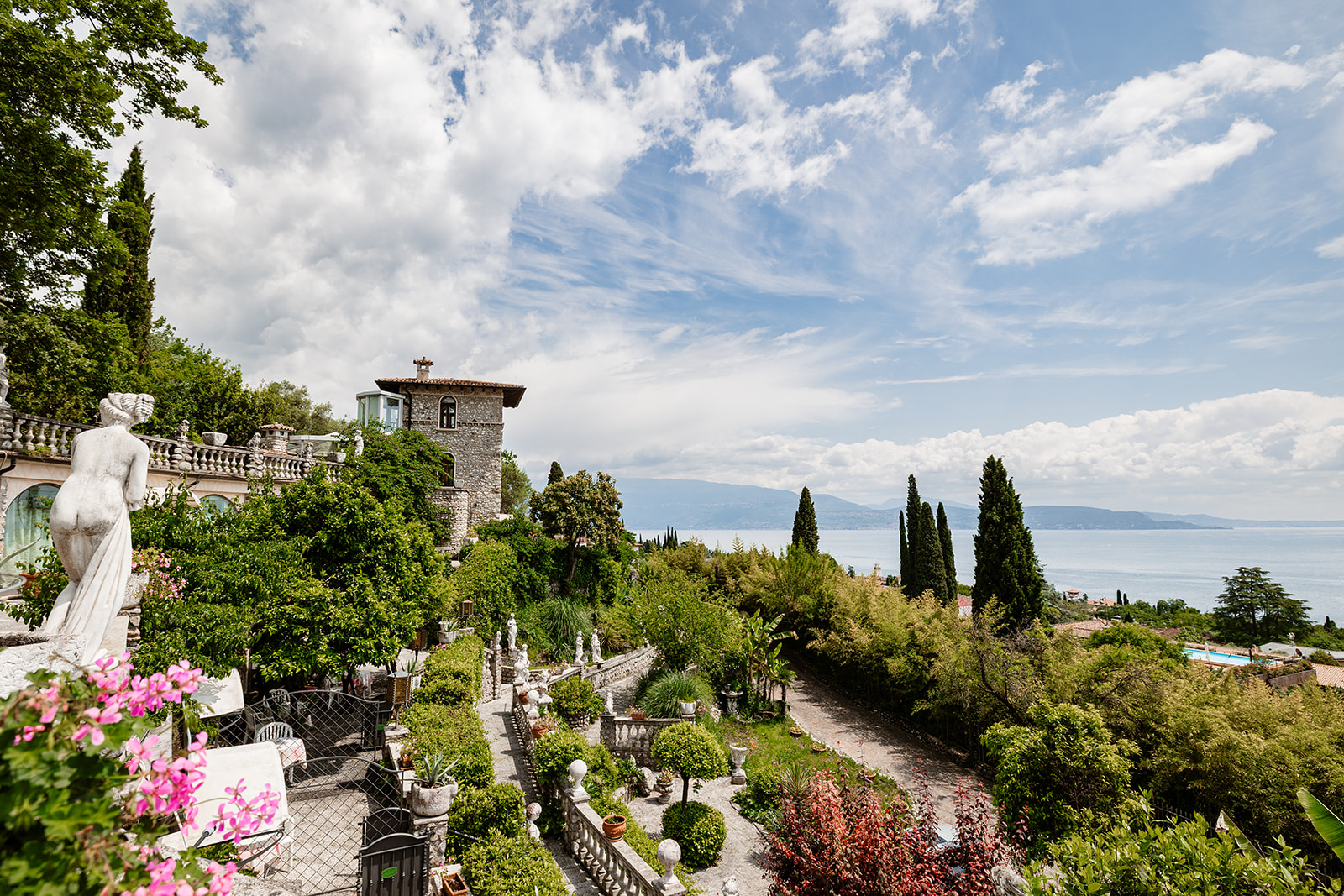 Gardone Riviera wedding photographer for ceremony setup in the gardens of a historic villa on Lake Garda